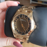 Marc Jacobs Henry Transparent Gold Dial Gold Steel Strap Watch for Women - MBM3206 Authentic Buy Shop Now