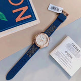 Guess Swirl Analog Quartz White Dial Blue Rubber Strap Watch for Women - W1096L4 Authentic Buy Shop Now