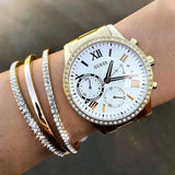 Guess Solar Chronograph Diamonds White Dial Gold Steel Strap Watch for Women - W1069L2 Authentic Buy Shop Now