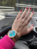 Guess Mini Sunrise Multi Function Analog Turquoise Dial Rose Gold Steel Strap Watch For Women - W0448L8 Authentic Buy Shop Now