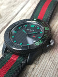 Gucci G Timeless Sport Black Dial Two Tone NATO Strap Watch For Men - YA126229 Authentic Buy Shop Now