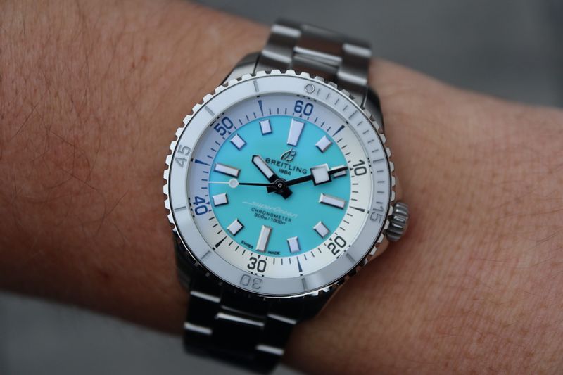 Breitling Superocean Automatic 36 Turquoise Dial Silver Steel Strap Watch for Men - A17377211C1A1 Authentic Buy Shop Now