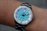 Breitling Superocean Automatic 36 Turquoise Dial Silver Steel Strap Watch for Men - A17377211C1A1 Authentic Buy Shop Now
