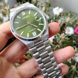 Citizen x Pantone Automatic Peaceful Green Dial Silver Steel Strap Watch For Men - NJ0158-89Z Authentic Buy Shop Now